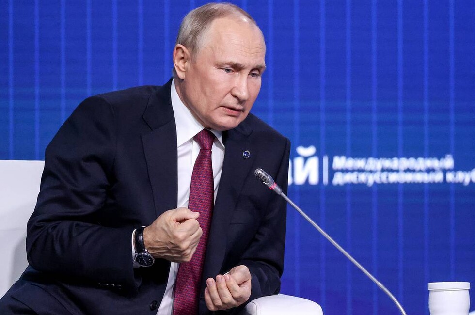 Путин